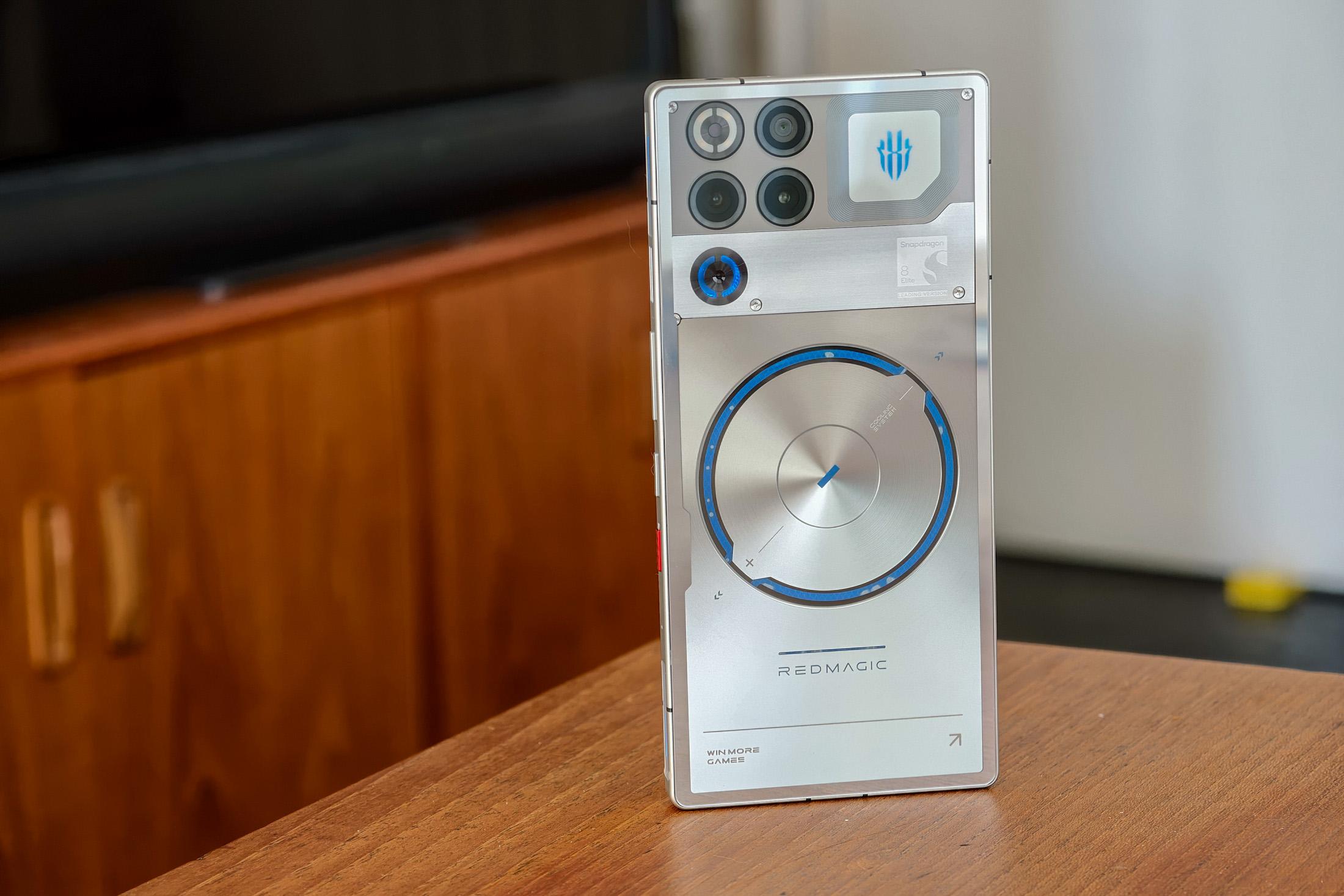 Photo of Redmagic 11S Pro in silver on a wooden table