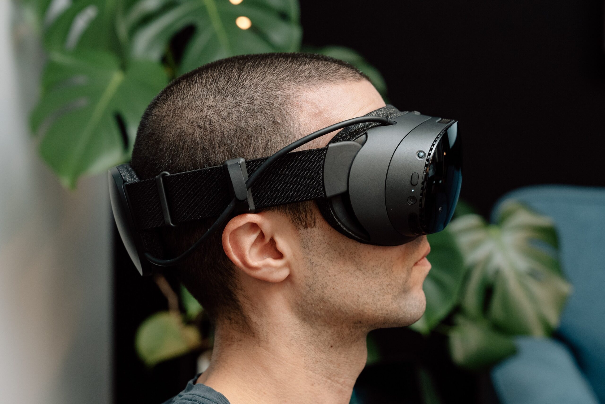 The Verge’s Jay Peters wearing Valve’s Steam Frame VR headset, from the side.
