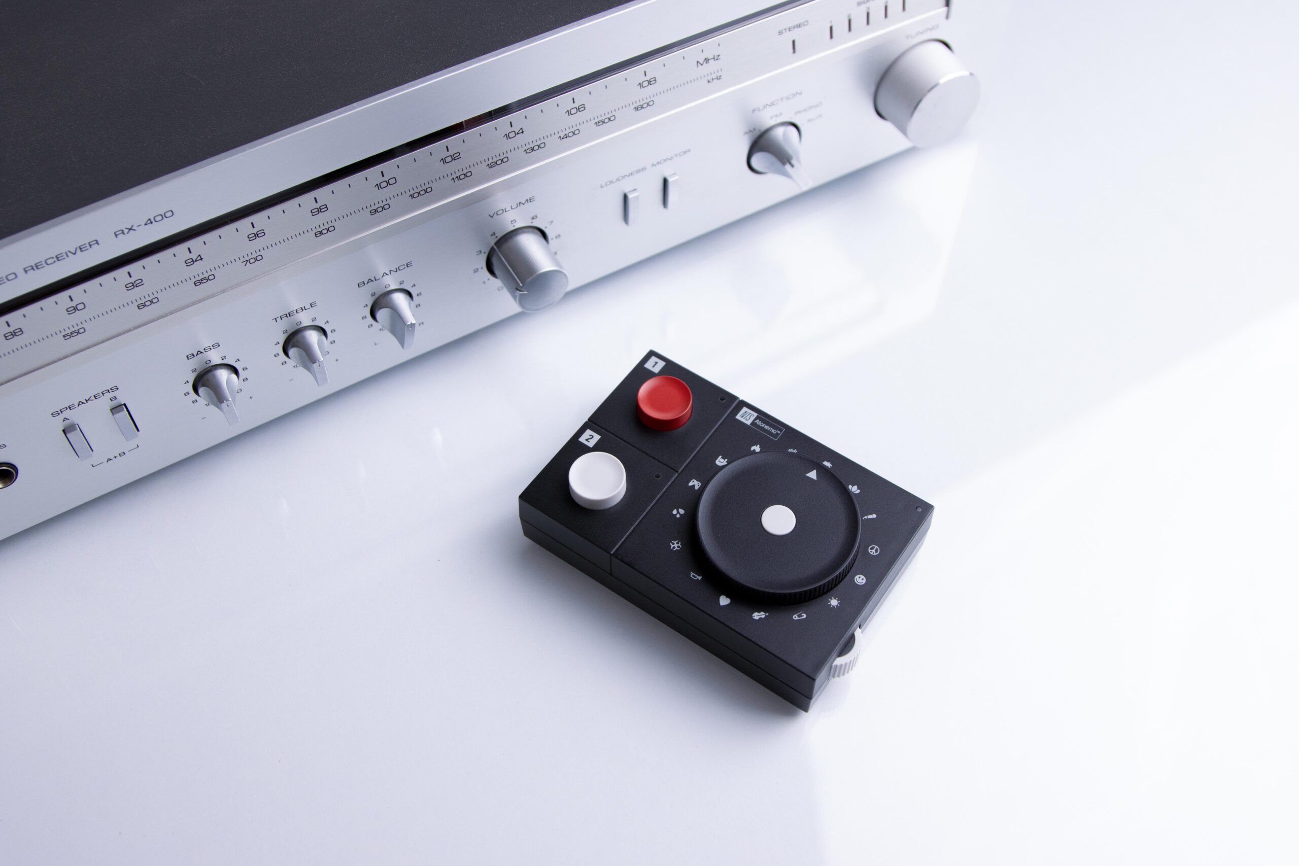 The NTS Radio Player from Atonemo in front of a vintage hi-fi receiver.