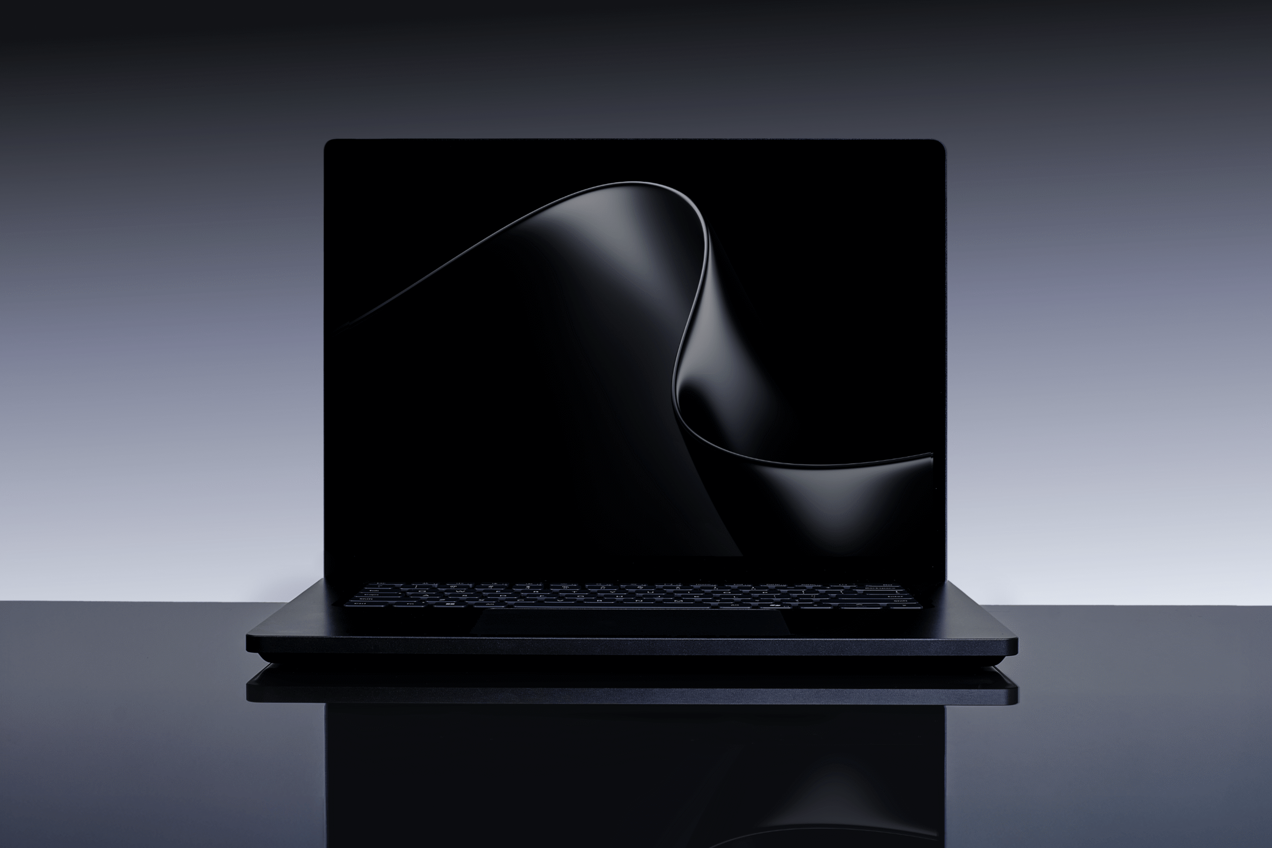 A shadowy image of a Microsoft Surface Laptop Ultra against a gradient gray background.