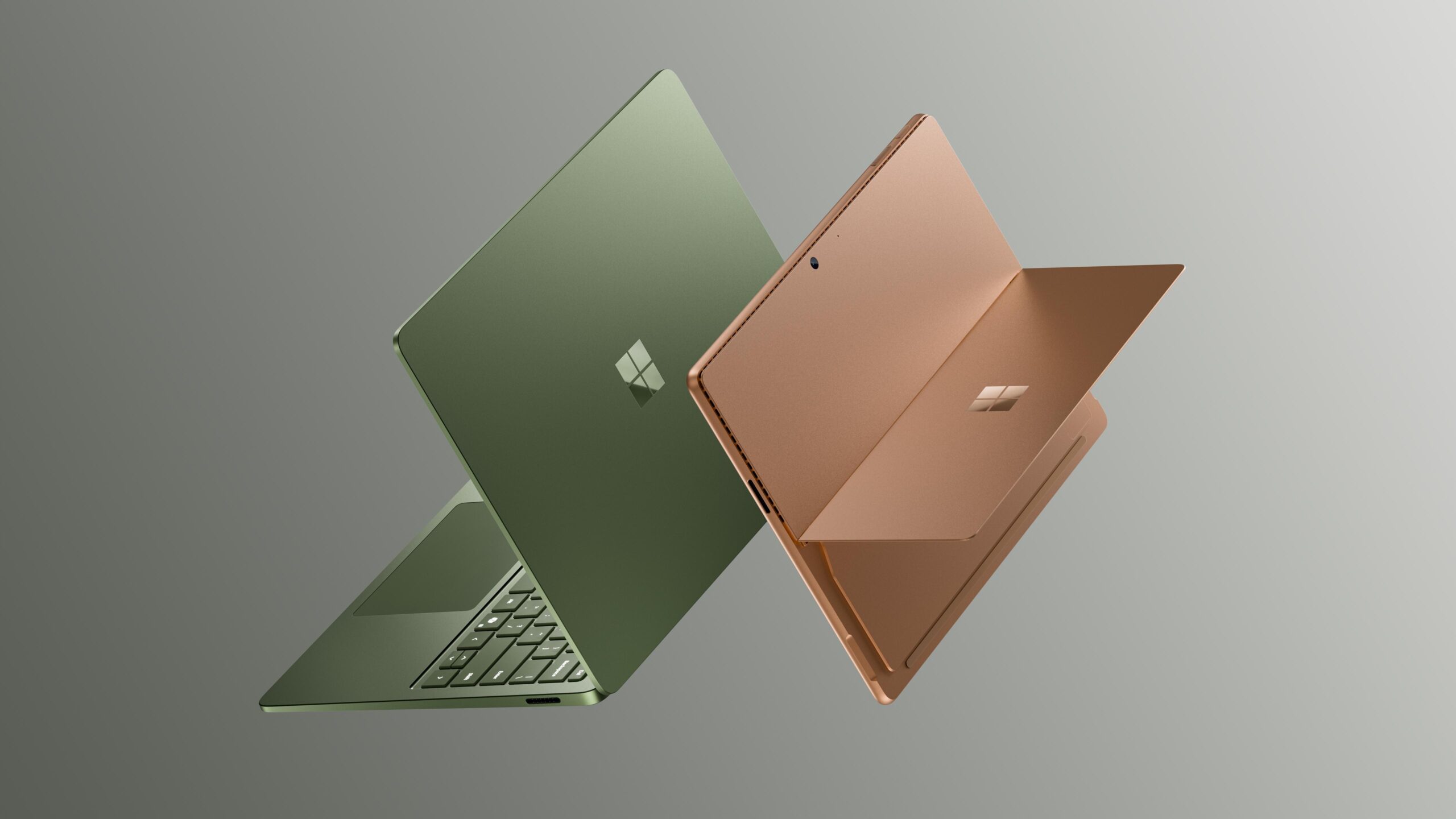 Isometric rear views of the jade colored Microsoft Surface Laptop 8th Edition and dune colored Surface Pro 12th Edition.