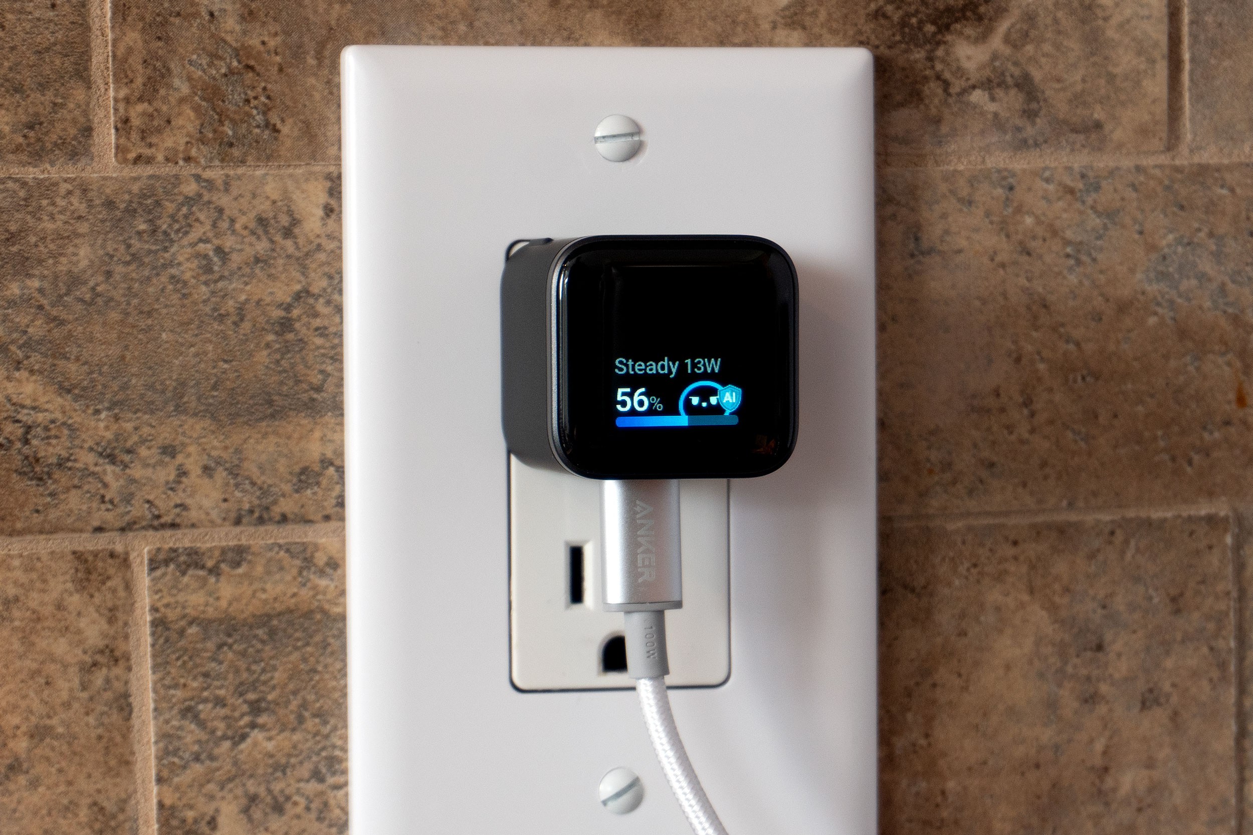 An Anker Nano 45W charger plugged into an outlet.