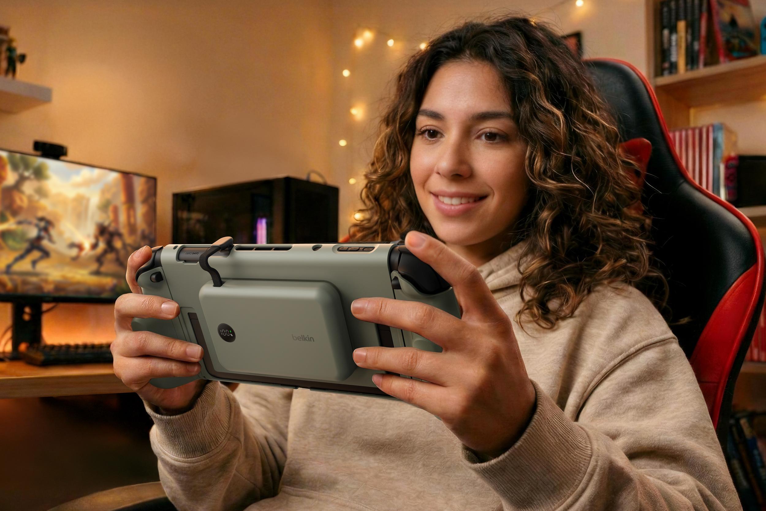 A person plays the Nintendo Switch 2 using Belkin’s Charging Grip.