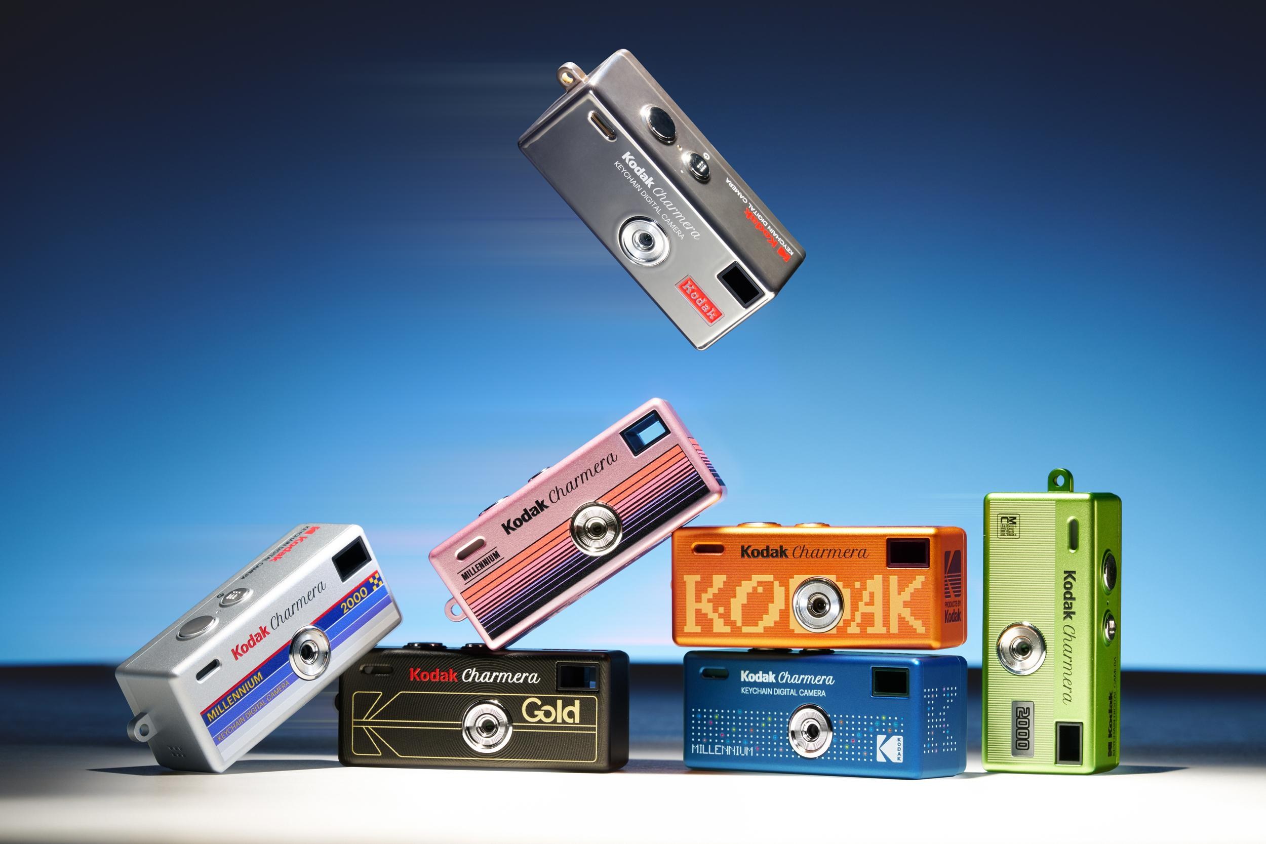A pile of Kodak Charmera Millennium Edition cameras.