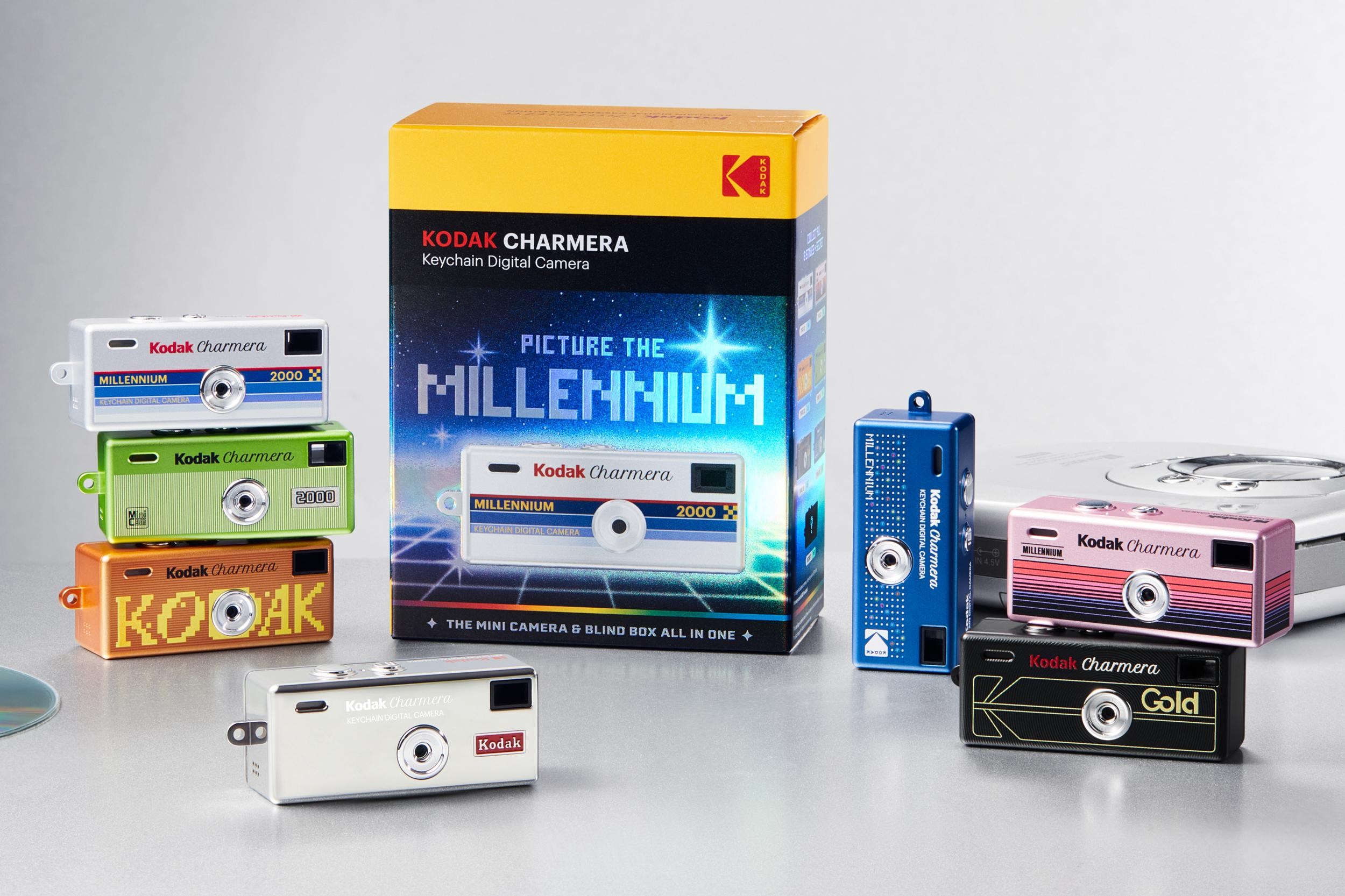 The collection of Kodak Charmera Millennium Edition cameras next to their packaging and retro gadgets. The collection of Kodak Charmera Millennium Edition cameras next to their packaging and retro gadgets.