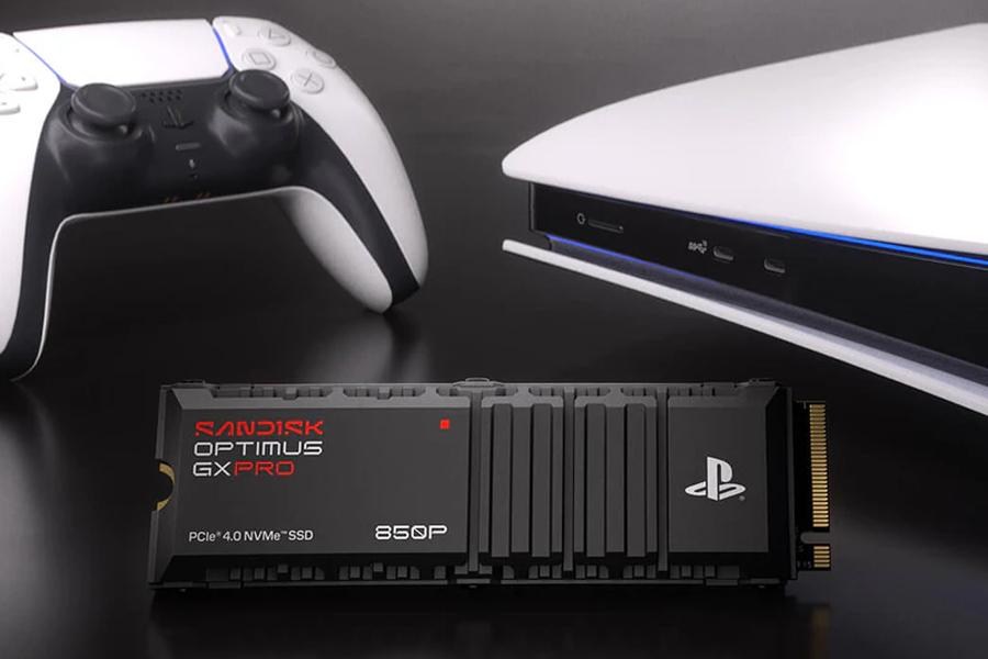 A SanDisk SSD sitting in front of a PlayStation 5 console and controller.