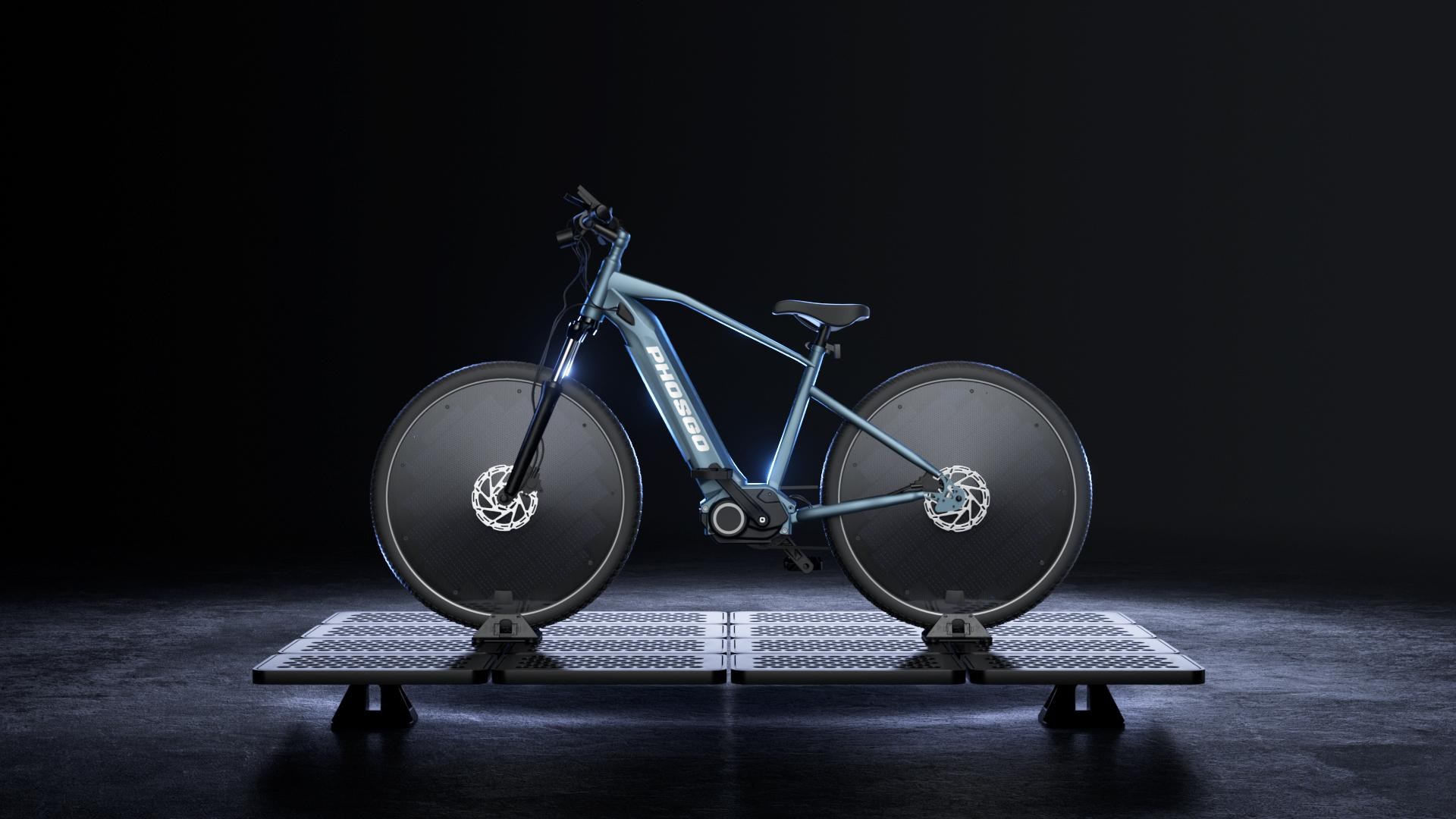 The bike shown in a dramatic profile, facing left, and mounted on top of a solar panel stand.
