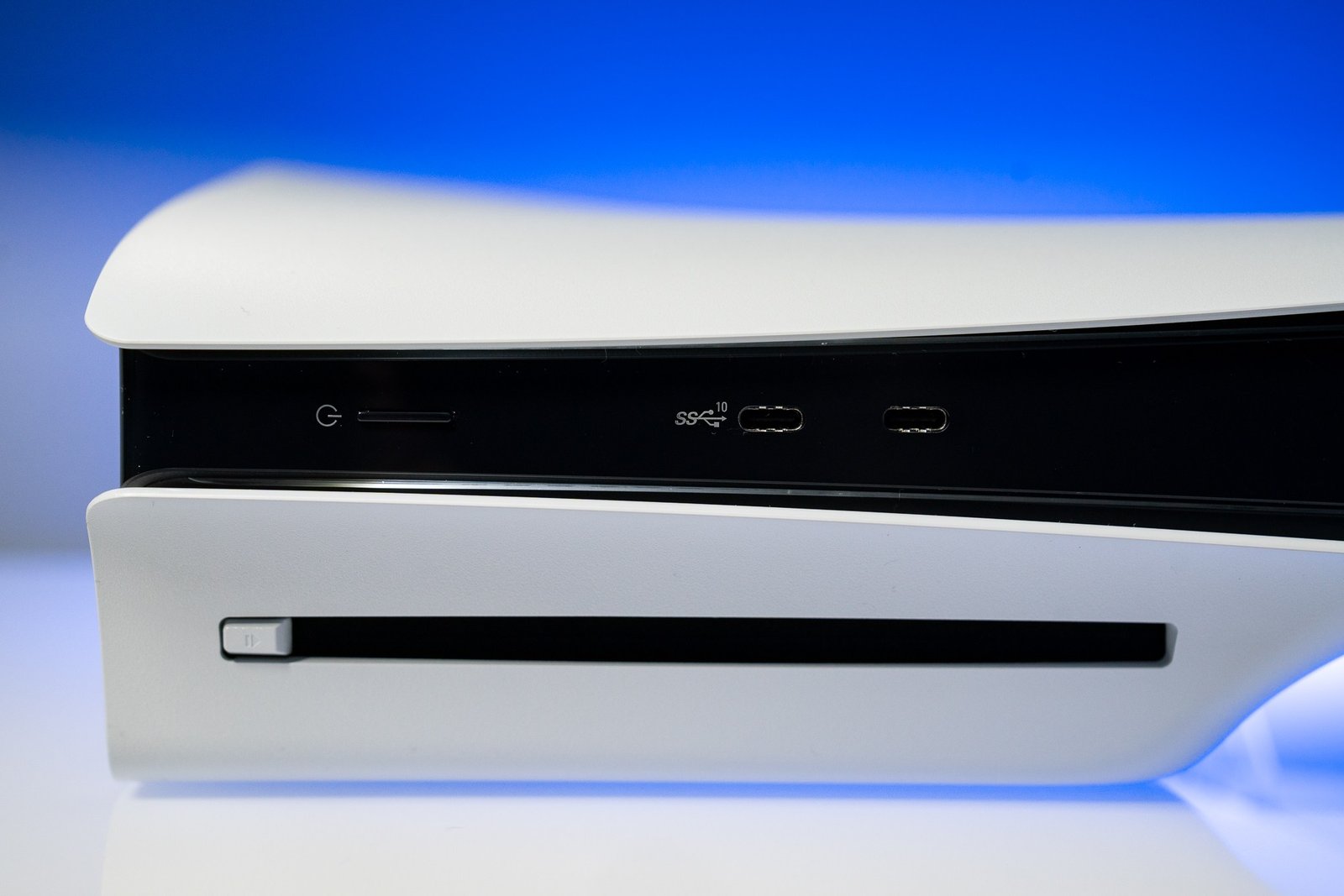 A photograph showing the Sony PlayStation 5 console disc drive.