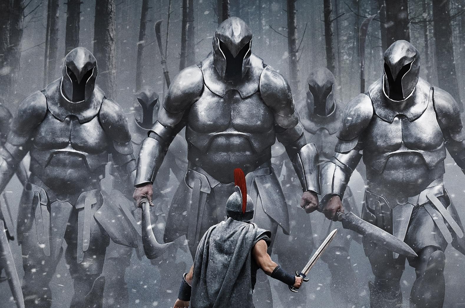 Promotional art for The Odyssey depicting a human soldier facing off against armored giants.