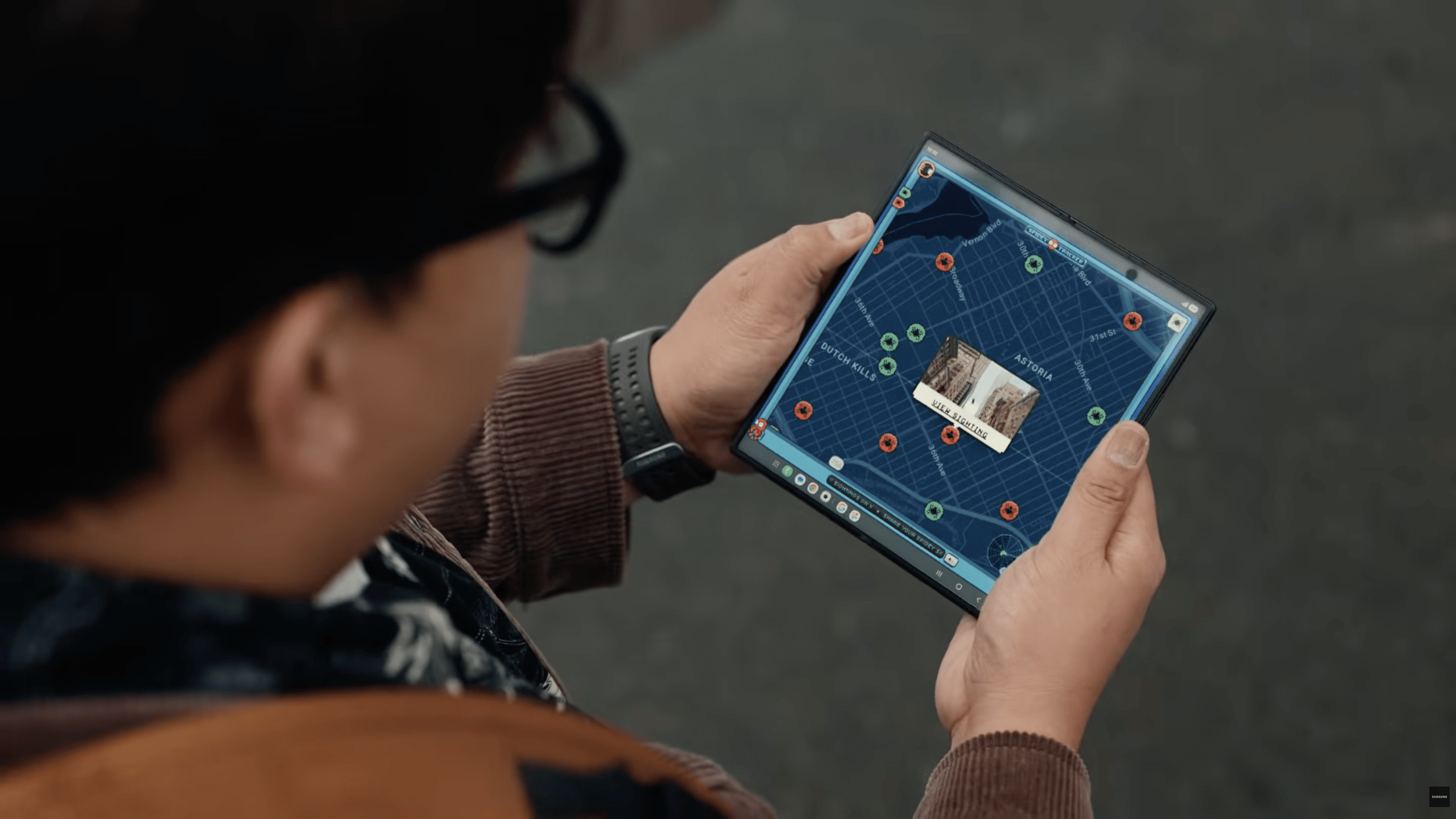 A screenshot of a Samsung Galaxy Z Fold phone in a Spider-Man teaser video