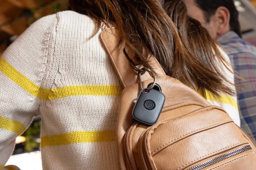 The Tile Pro attached to a backpack