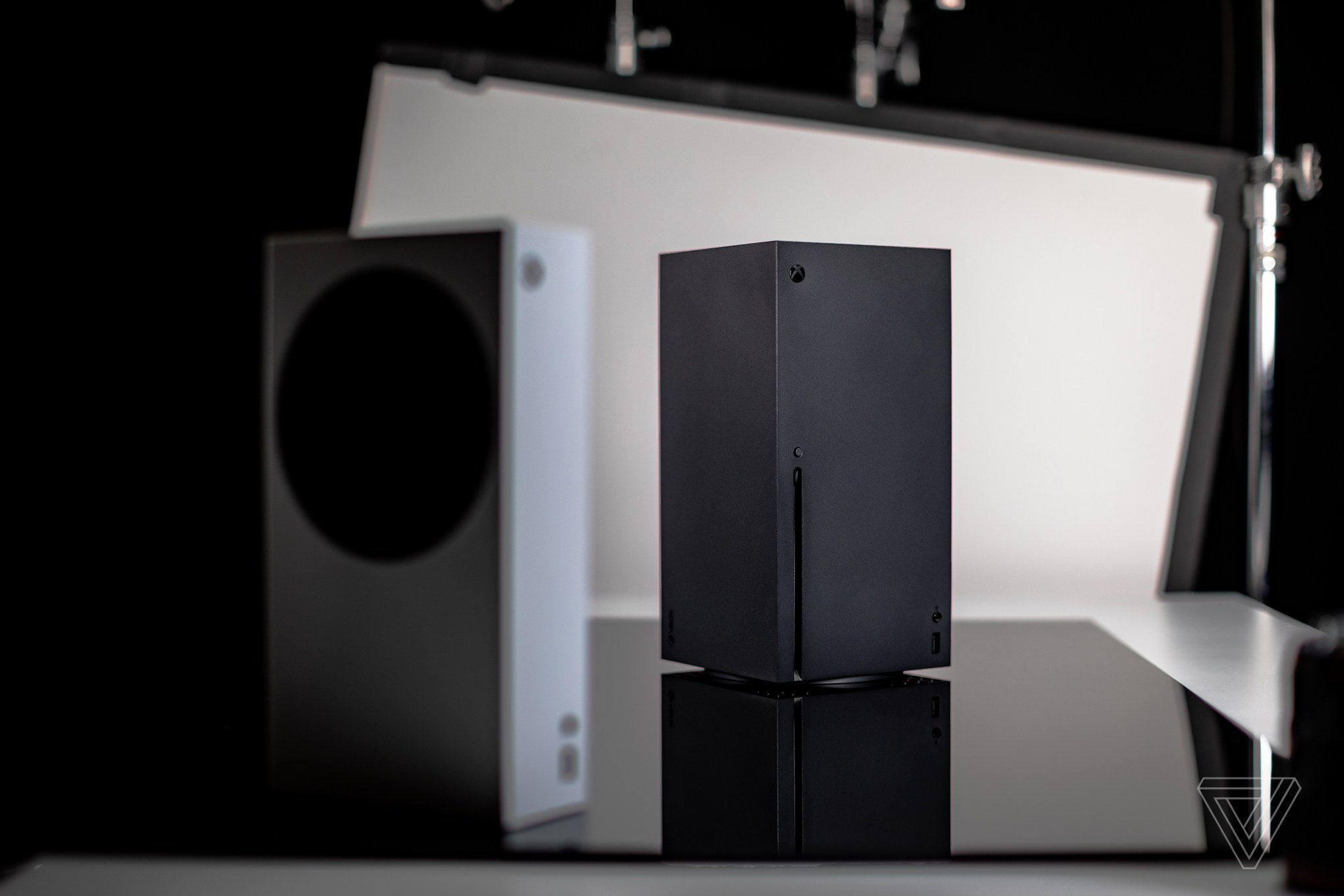 The Xbox Series S and X next to each other. 