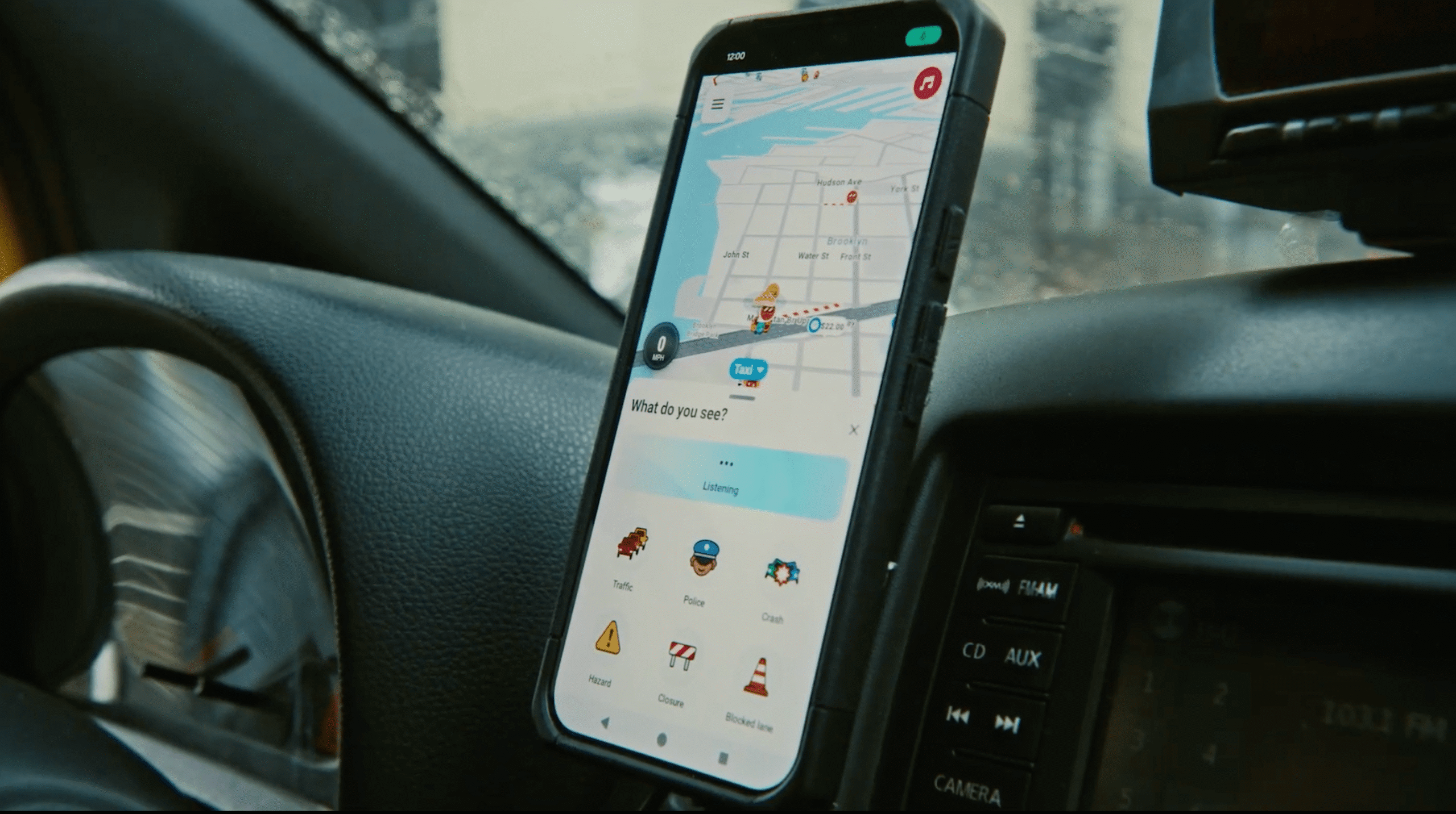 An image showing Waze’s conversational reporting feature