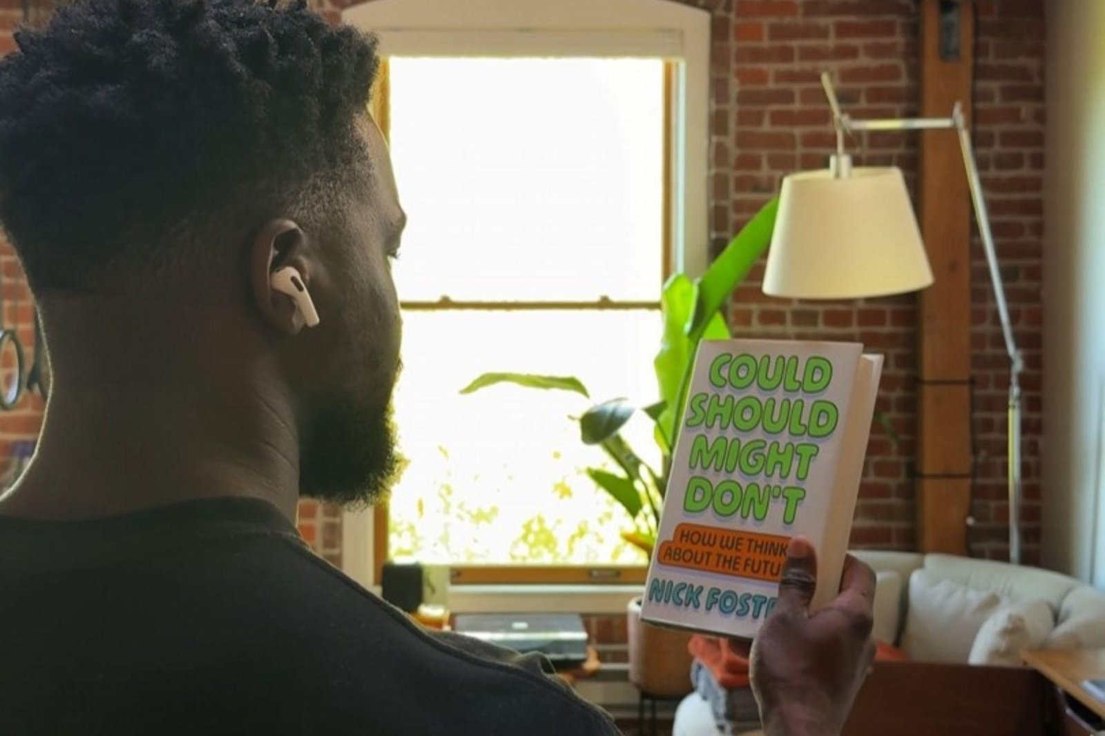 A snapshot taken from a leaked demo video of Apple’s camera-equipped AirPods.