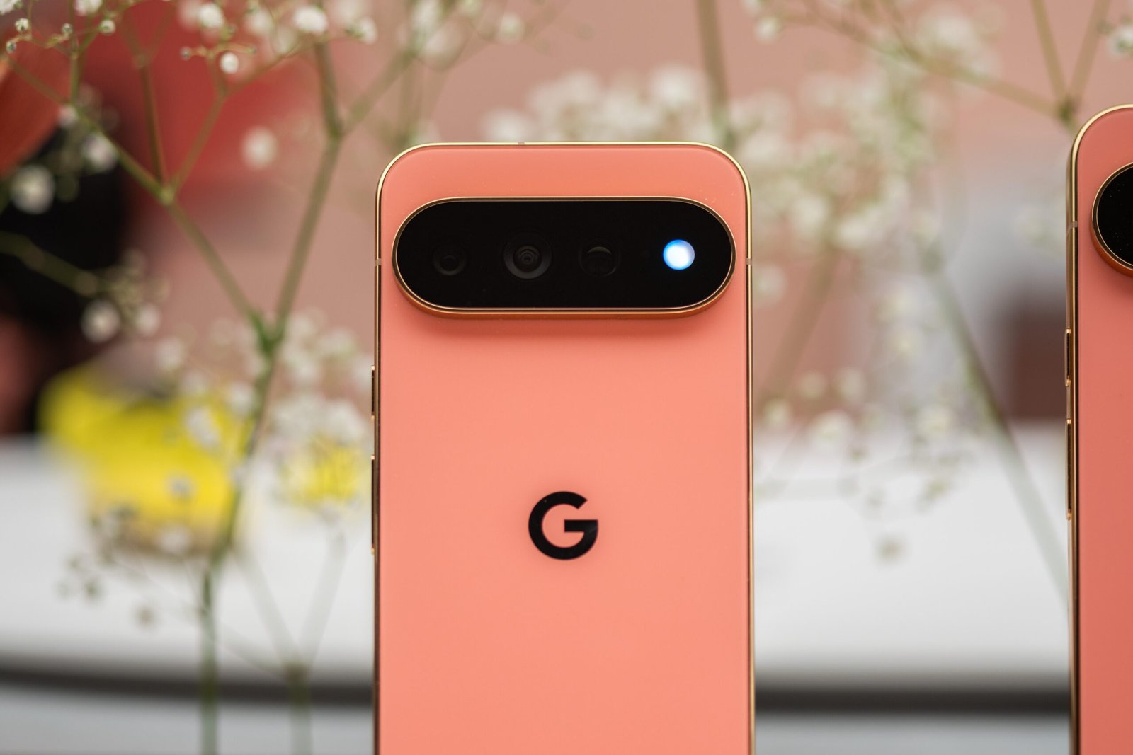 A coral pink Google Pixel phone