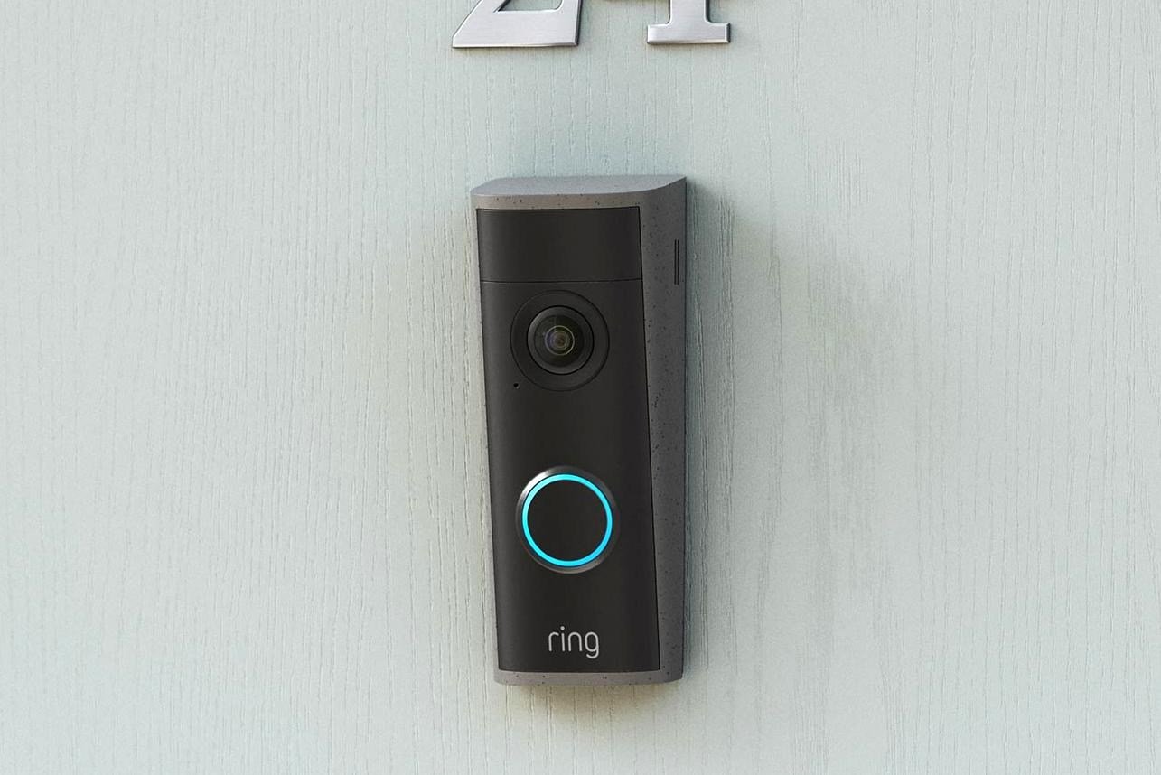 The Ring Peephole Cam 2K installed on a door.
