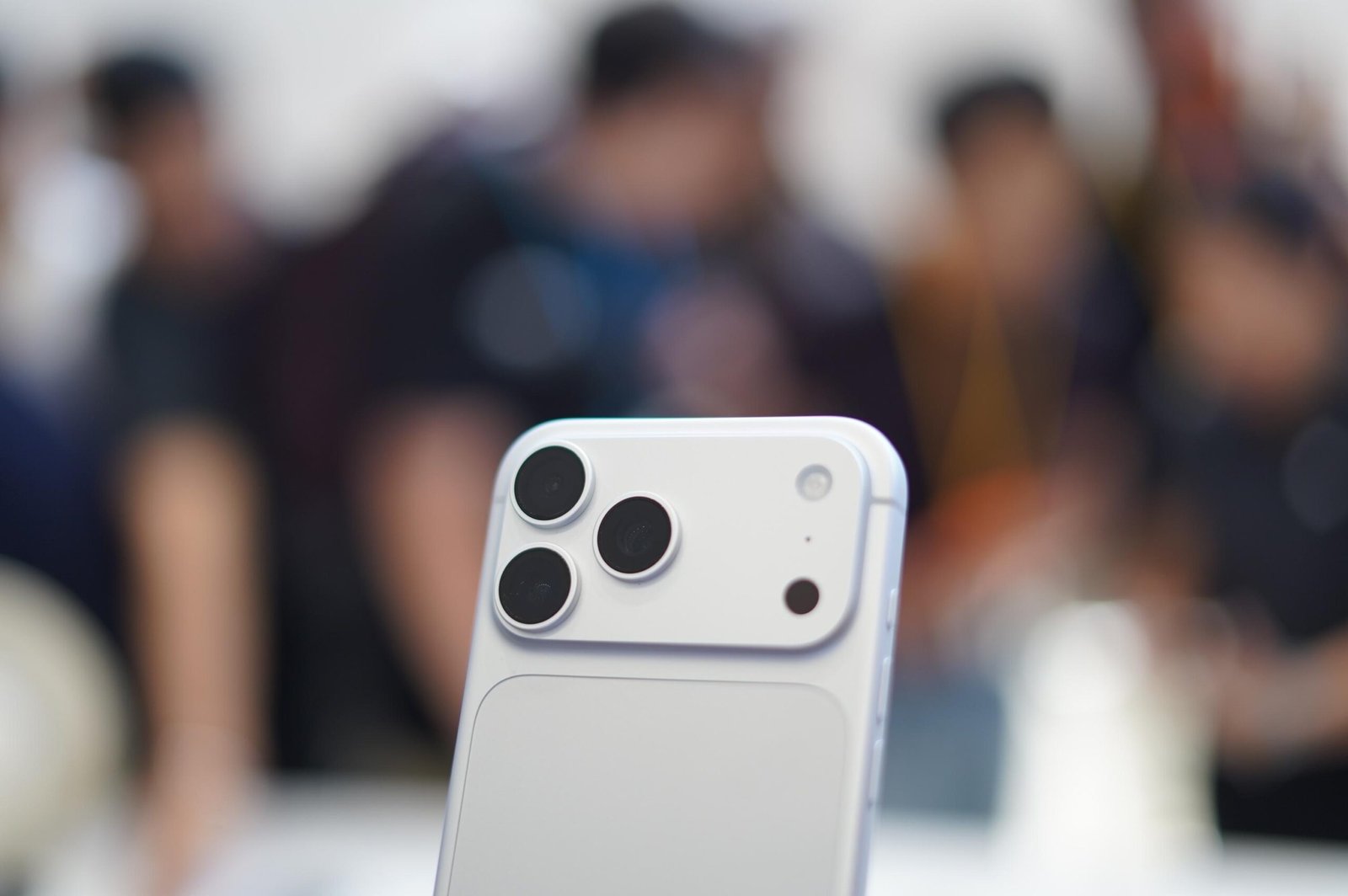 An iPhone 18 Pro phone in silver.