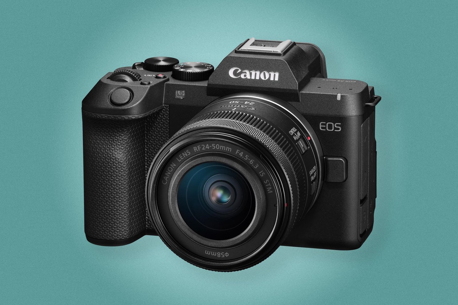 The Canon EOS R8 Mark II with a lens attached against a green background.