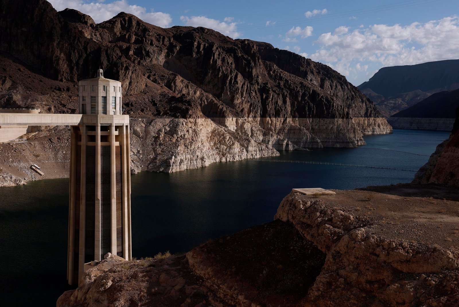 A view of a reservoir with a low water level.