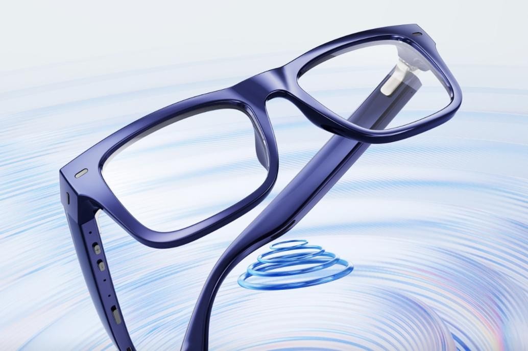 The Nuance Audio Plus smart glasses hovering over an illustration of sound waves.