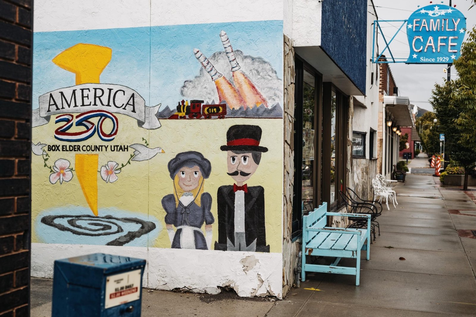 An America 250 mural painted on the side of a building in Brigham City.
