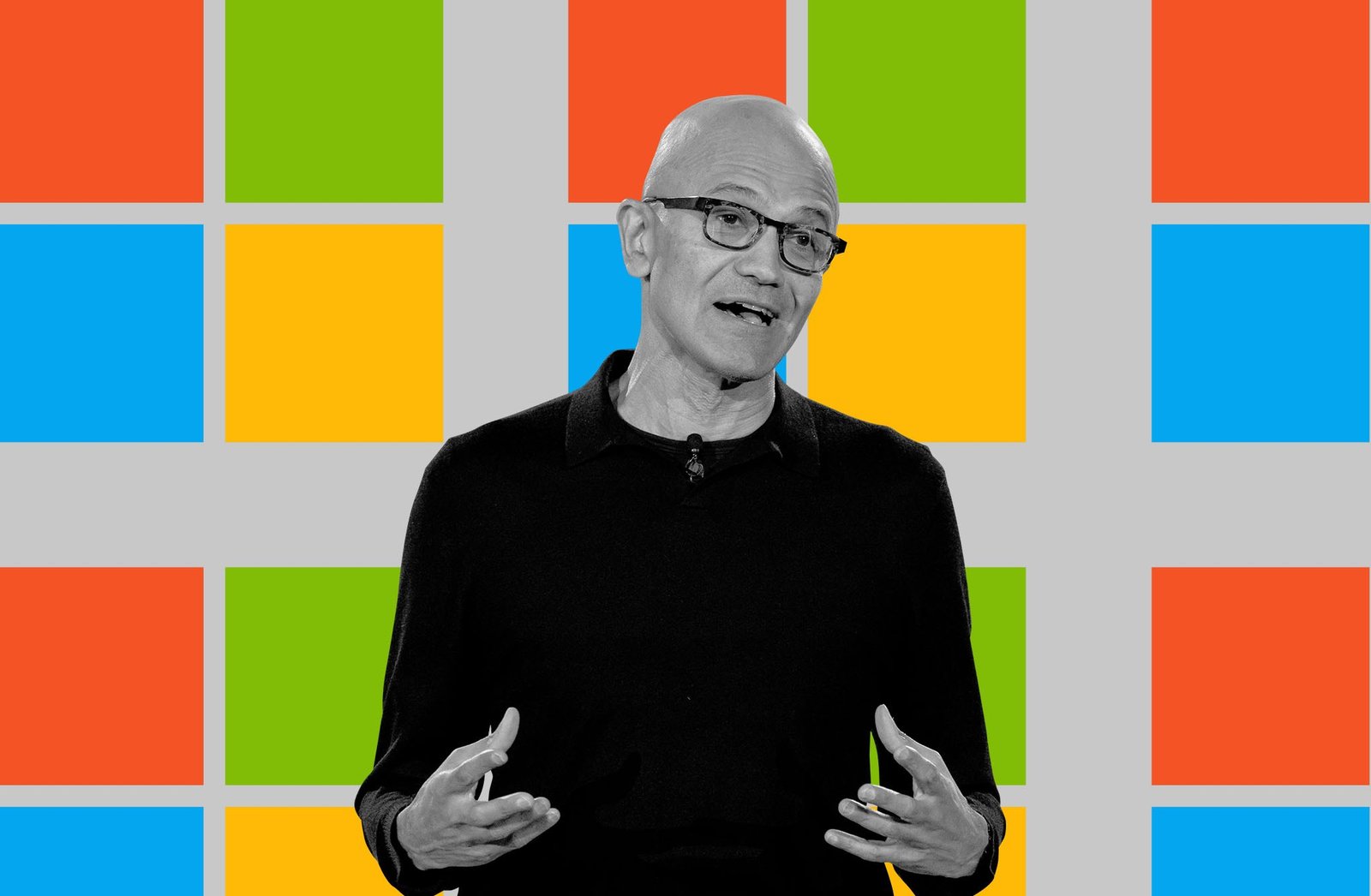 Satya Nadella on a graphic background of the Windows logo.