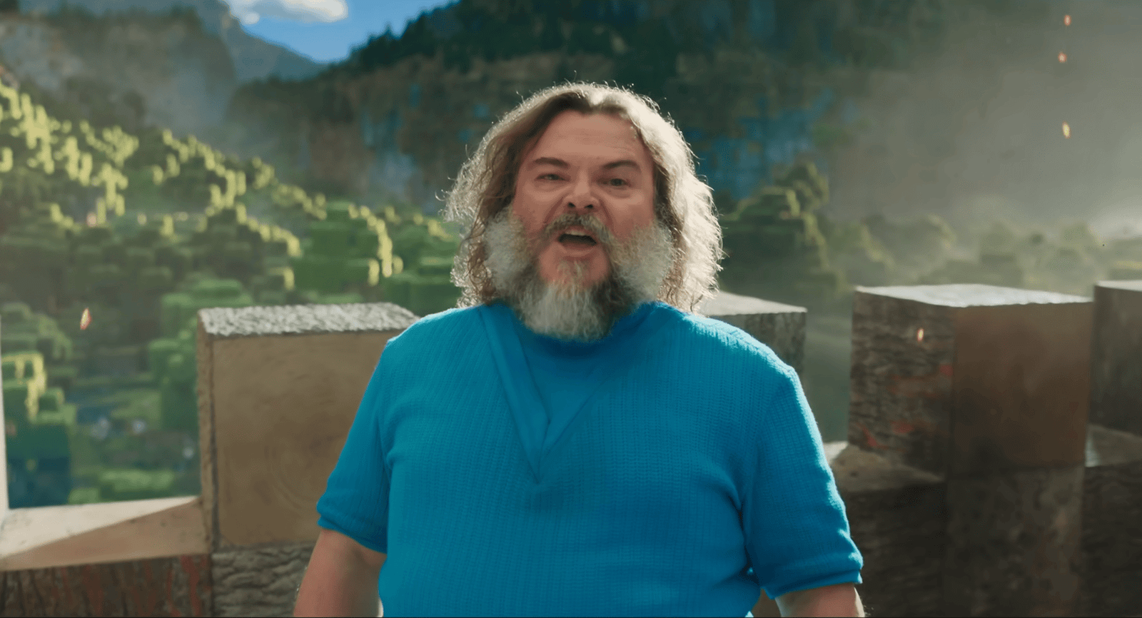 Screenshot from A Minecraft Movie featuring Jack Black in a bright blue t-shirt.