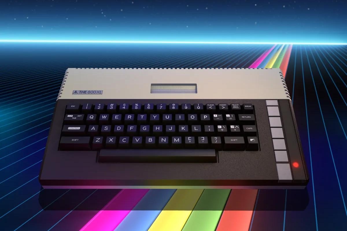 Atari’s The 800XL retro PC against a colorful illustrated backdrop.