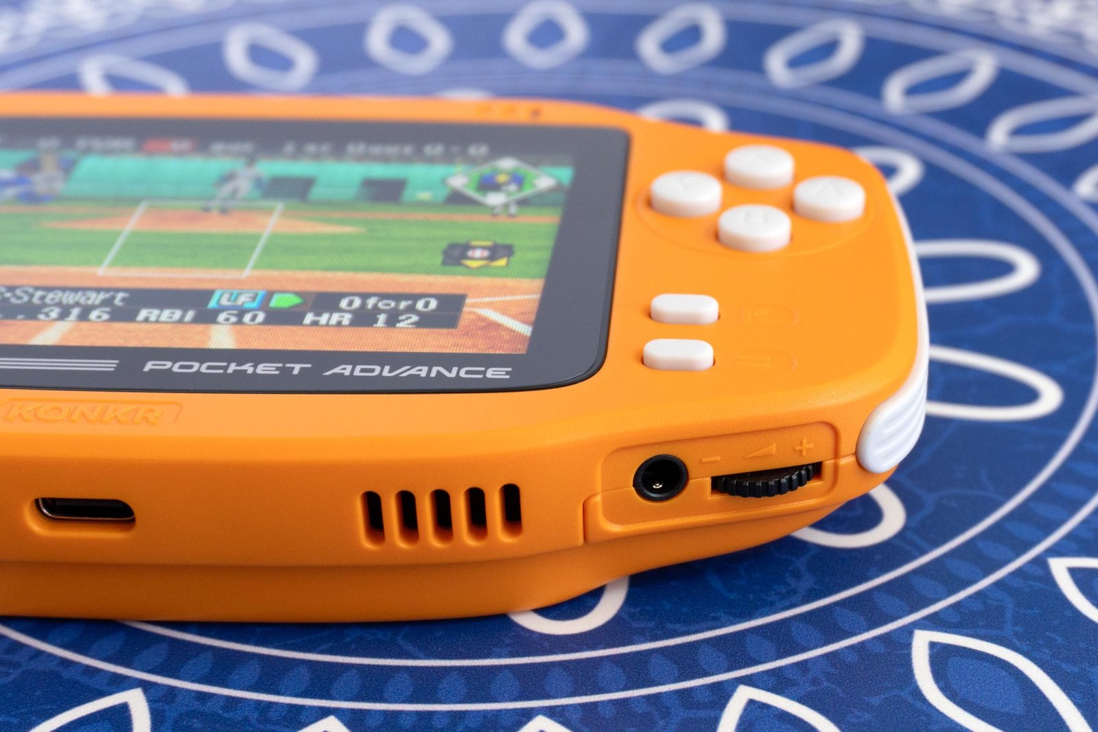A close-up of the Ayaneo Konkr Pocket Advance’s headphone jack and volume dial control. A close-up of the Ayaneo Konkr Pocket Advance’s headphone jack and volume dial control.