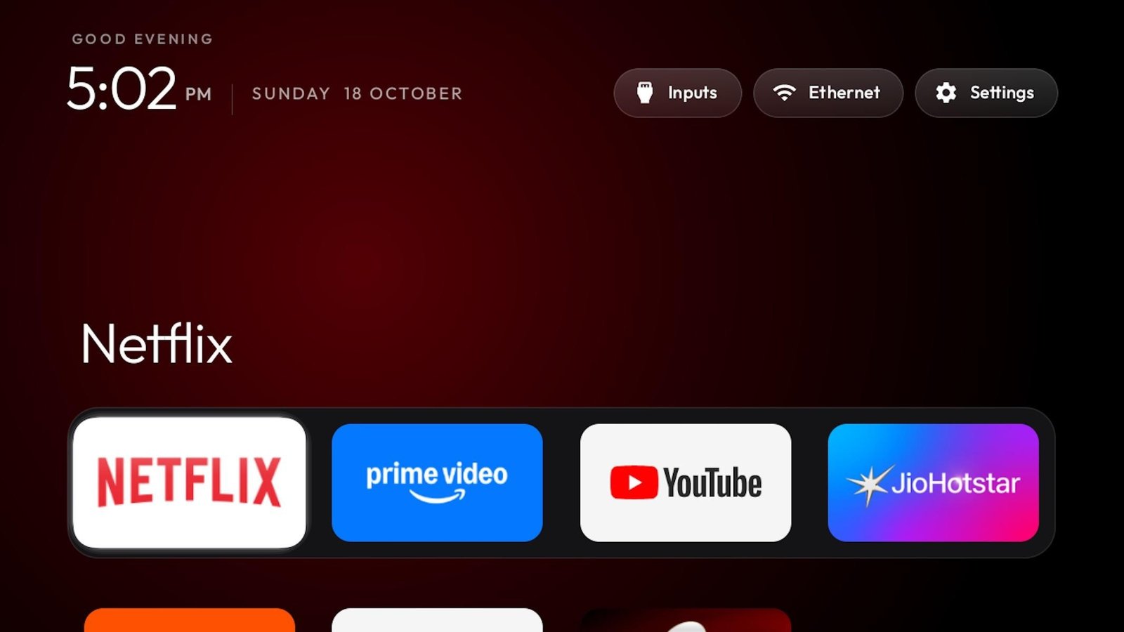 A TV operating system homepage without ads and large tiles to select different streaming services.