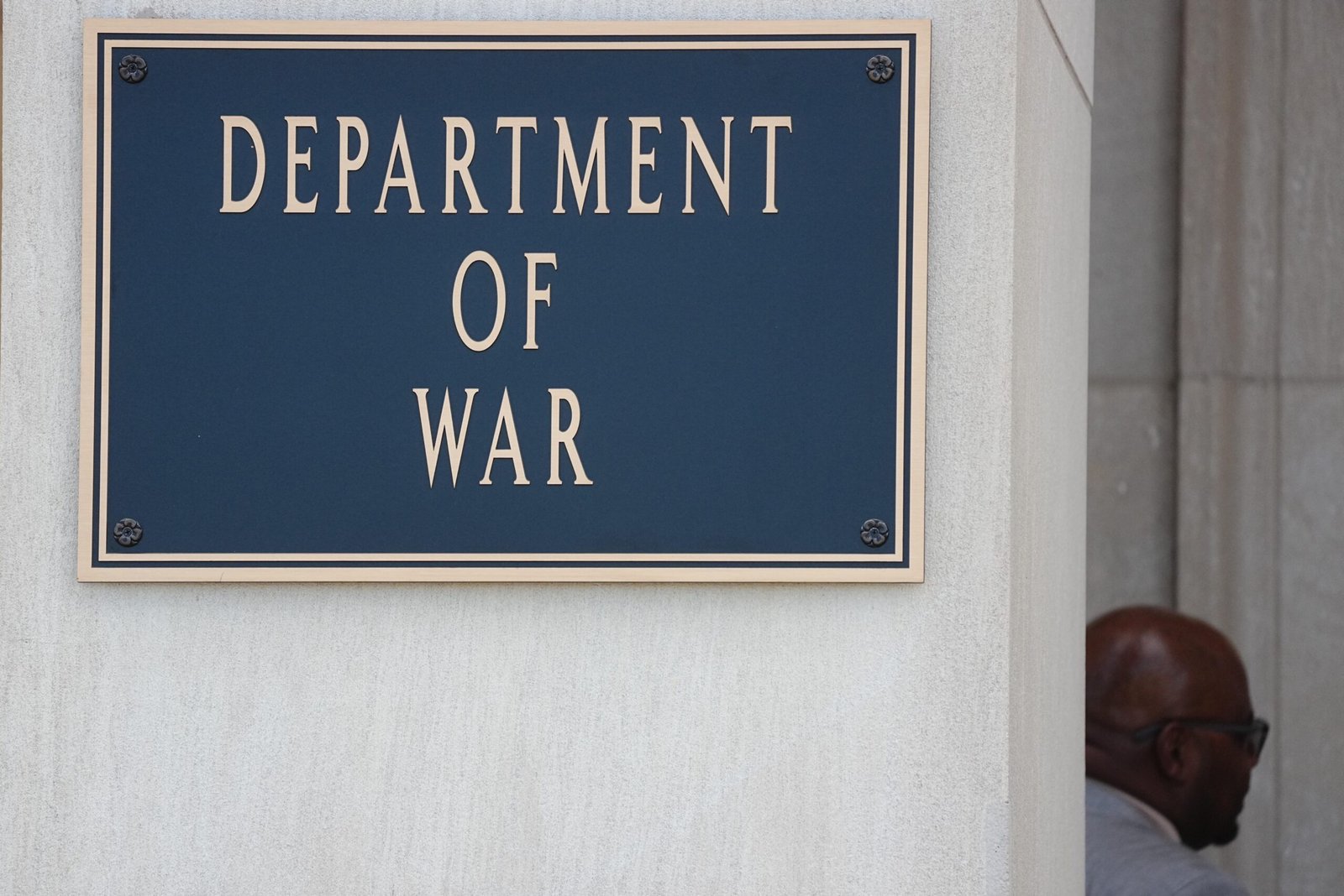 A sign saying the “Department of War” at the Pentagon