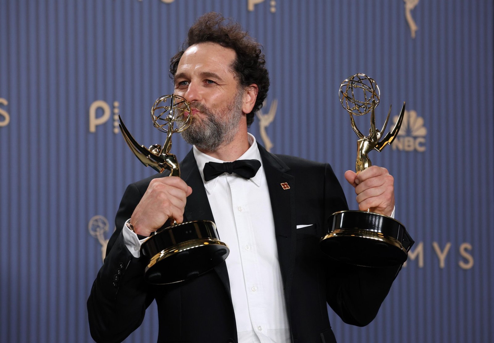 LOS ANGELES, CALIFORNIA - SEPTEMBER 14: Matthew Rhys, winner of the Outstanding Lead Actor in a Comedy Series Award for "Widow's Bay" and the Outstanding Lead Actor in a Limited or Anthology Series or Movie Award for "The Beast in Me" poses in the press room during the 78th Primetime Emmy Awards at Peacock Theater on September 14, 2026 in Los Angeles, California. (Photo by Kevin Mazur/Getty Images)